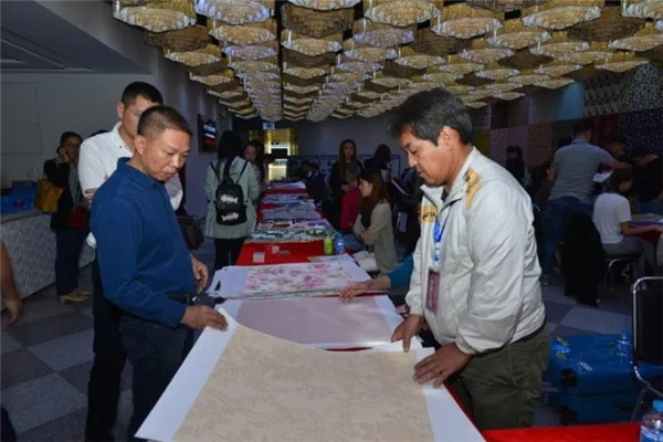 家紡畫稿交易會十年磨一劍礪得梅花香